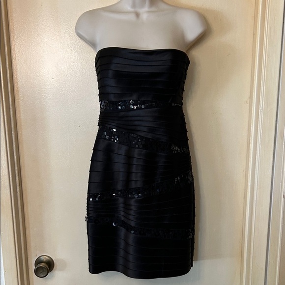 BCBGMaxAzria Dresses & Skirts - BCBGMaxAzria Strapless Black Dress with Sequins size 2
